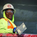 A trades worker from Oregon Tradeswomen Inc. at her job site.