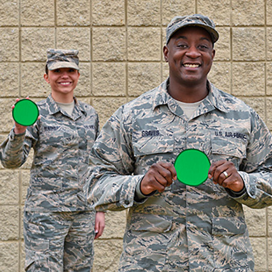 The 182nd Airlift Wing announced plans to implement the Green Dot violence-prevention initiative into its sexual assault prevention and response program in 2016. The program helps highlight how individual choices combat abuse in military and civilian communities, said Wing Executive Officer Lt. Col. Steven Thomas. (U.S. Air National Guard photo illustration by Staff Sgt. Lealan Buehrer)